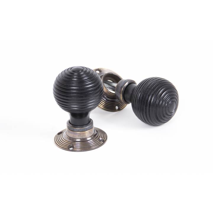 Ebony Mortice/Rim Beehive Knob Set - Antique Brass Roses