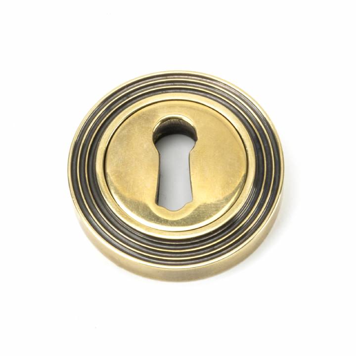 Aged Brass Round Escutcheon (Beehive)