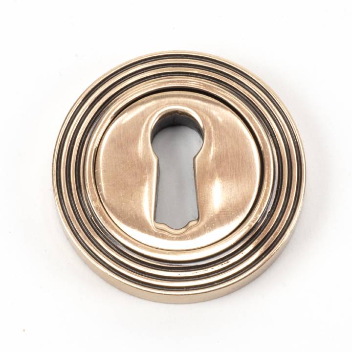 Polished Bronze Round Escutcheon (Beehive)