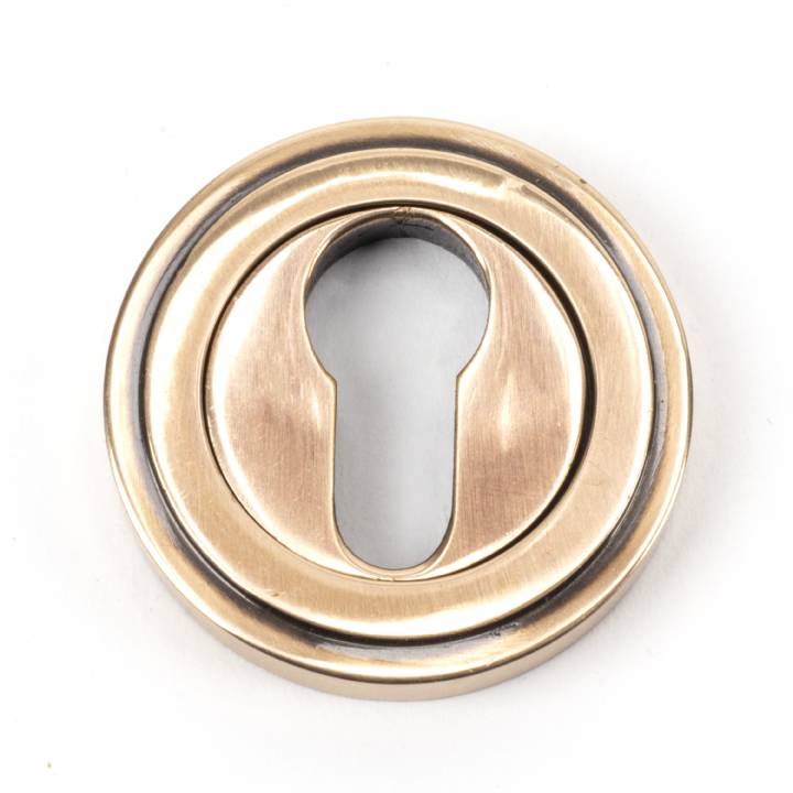 Polished Bronze Round Euro Escutcheon (Art Deco)