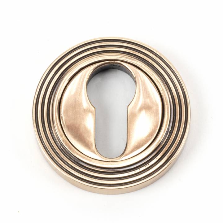 Polished Bronze Round Euro Escutcheon (Beehive)