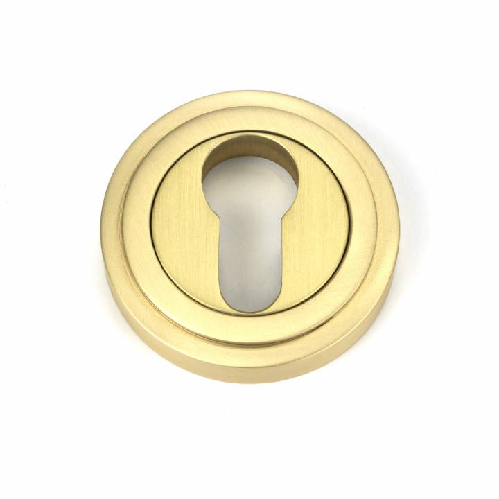 Satin Brass Round Euro Escutcheon (Art Deco)