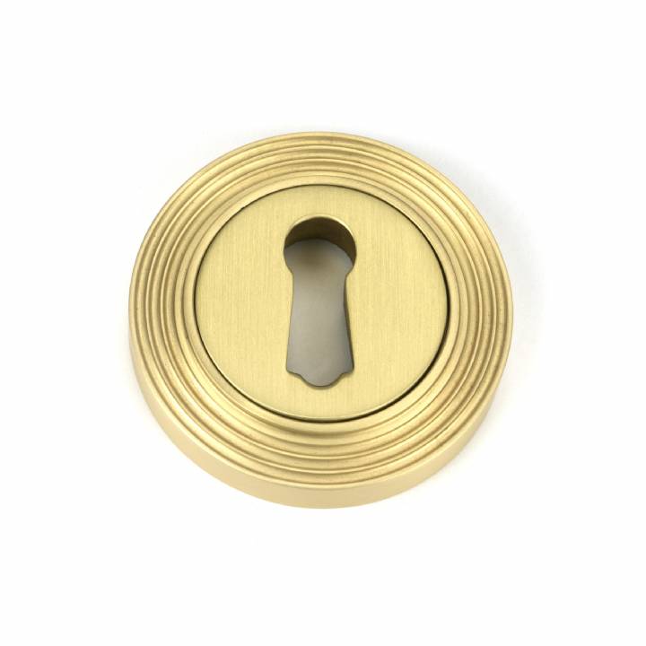 Satin Brass Round Escutcheon (Beehive)